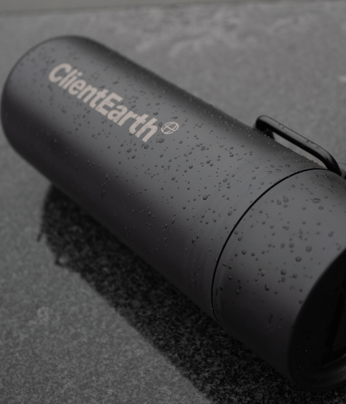 Black promotional bottle with laser engraved logo