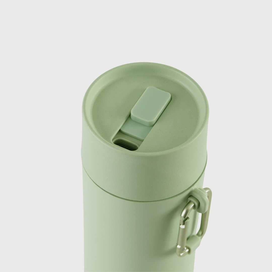 Slide to lock mouthpiece shown on S'wheat reusable bottle in green